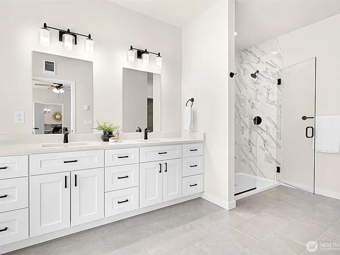 Double vanity and glass shower