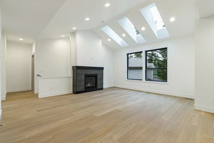 Vaulted great room, wide-plank flooring