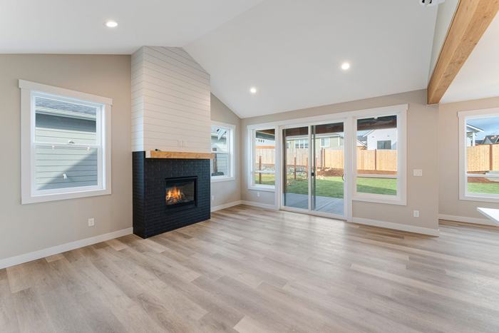 Entry hall with wide-plank wood flooring