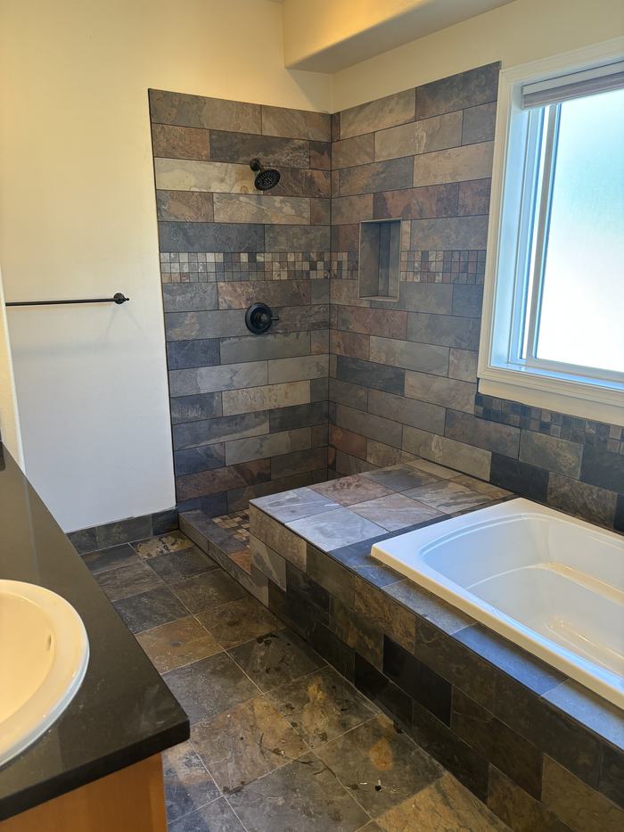 Slate tile shower and bath floor
